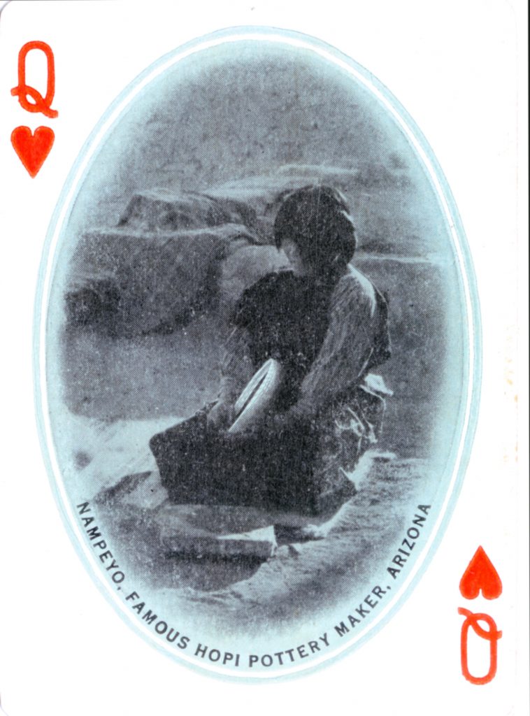 Vintage playing card (Queen of Hearts) featuring a sepia-toned image of Nampeyo, a Hopi pottery maker from Arizona, seated and working with clay.