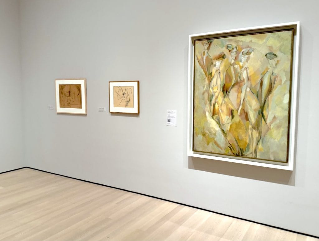 Three framed artworks by Marcel Duchamp, including the oil painting The Bush, hang on a white gallery wall above a light wood floor.