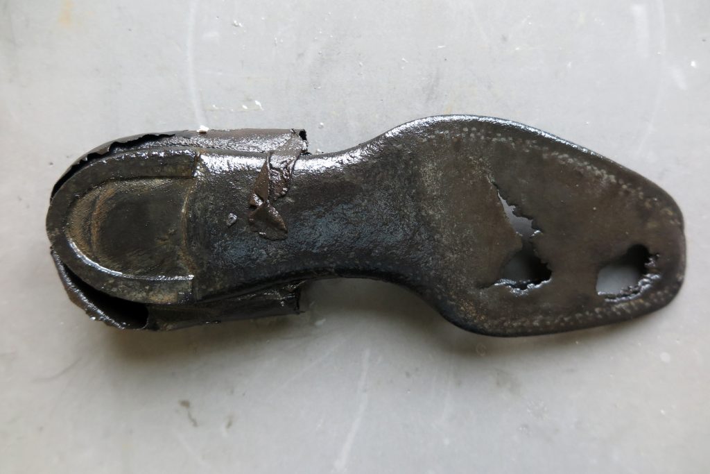 an old shoe laid on a table